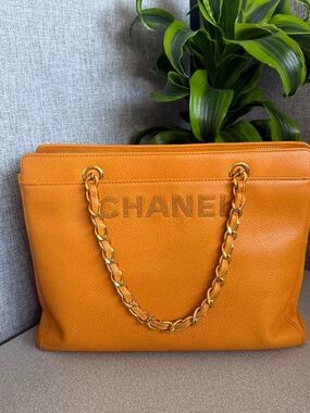 CHANEL yellow Leather Chain-Handle Tote measures 12  x 4 x 9